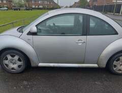 Volkswagen New Beetle (NA)...