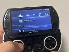 Sony PSP Go with charging c...
