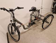 Zet trehjulig elcykel