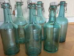 gamla flaskor med patentkork.