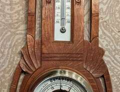 Barometer med termometer.