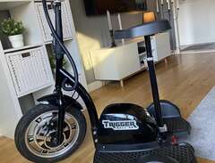 trehjulig scooter