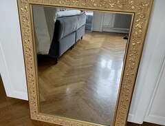 Spegel med guldram 85x64