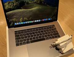 MacBook Pro 15" Touch Bar M...