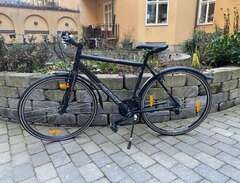 Merida hybrid cykel