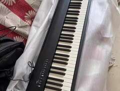 Roland FP-30X digital piano...