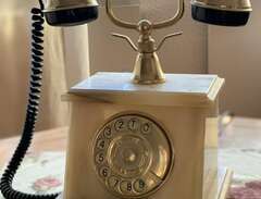 Antik telefon i alabaster