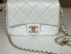 21 K Chanel Mini väska