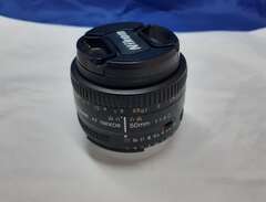 Nikon 50mm 1:1.8D objektiv...