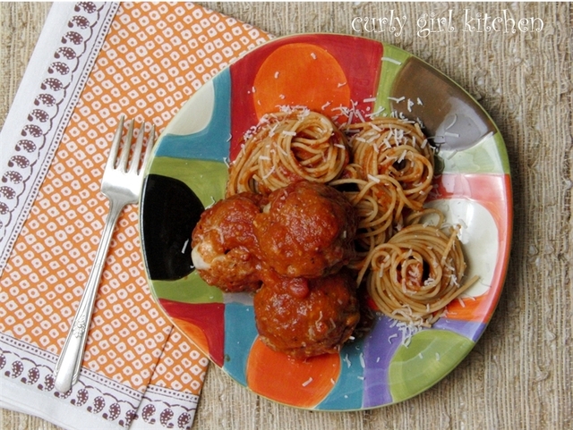Mozzarella-Stuffed Turkey and Pork Meatballs, with Spaghetti Marinara...
