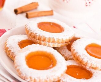 Biscotti occhio di bue: la ricetta dei dolcetti con morbido ripieno
