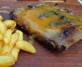 Gekonfijte Varkensribbetjes van het Iberico varken met Sinaasappelbarbecuesaus