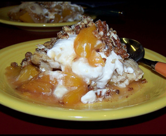 Peach Cobbler with Bourbon Cream and Candied Pecans