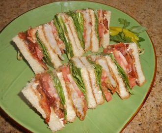 Club Sandwich of Pan Fried Swai, Spinach and Smoked Bacon