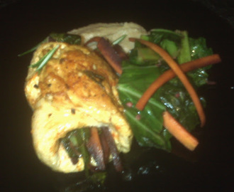 Chicken stuffed with collard greens carrots and parmesan on celery root apple puree