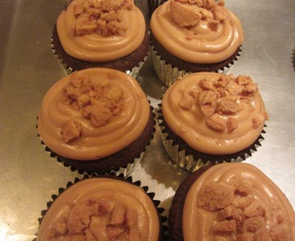 Nutter Butter Stuffed Cupcakes with Rich Peanut Butter Frosting