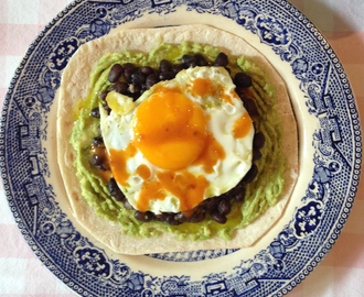 Amazing Breakfast Tortilla with crushed avocado, black beans and coconut oil fried egg (GF)