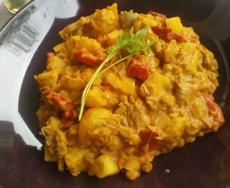 buntes veganes Kartoffel-Curry mit Linsen, Paprika und Champignons
