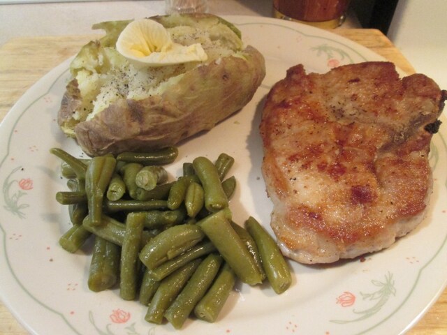 Fried Pork Chop w/ Green Beans, Baked Potato, and Whole Grain Bread