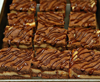 CHOCOLATE COOKIE BARS STUFFED WITH PEANUT BUTTER CUP CHEESECAKE