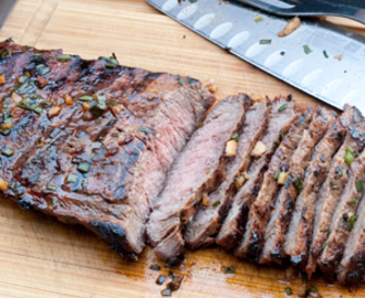 Tropical marinated flank steak to grill at home or at the campsite