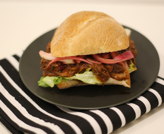 Barbecue pulled pork sandwiches with pickled red onion