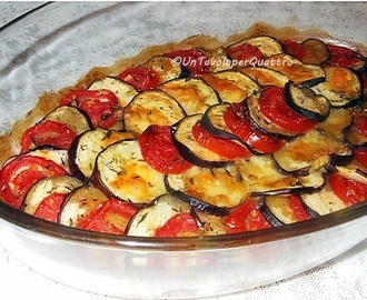 Melanzane al forno con pomodori e mozzarella