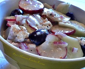 Opa!!!  Cucumber Salad with Kalamata Olives, Goat Cheese and Spicy Radish Slices