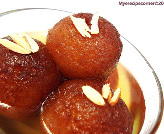 Home-made Gulab Jamuns( Golden fried milk balls in flavored sugar syrup)