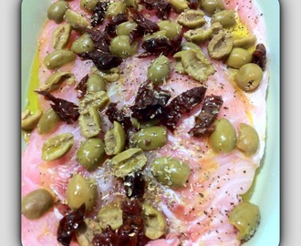 Filetto di pece persico con olive e pomodori secchi