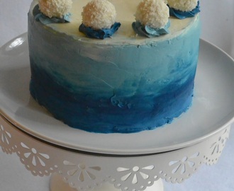 Sinivalkoinen liukuvärjätty suklaakakku