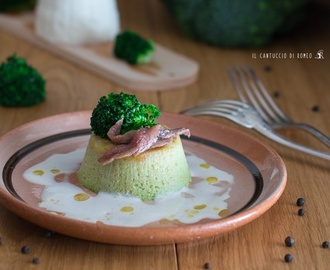 Flan di broccoli e ricotta con crema al pecorino e acciughe
