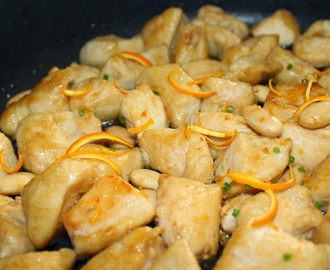 Chicken bites with teriyaki sauce and orange zest