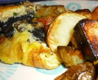 Courgette and mushroom rarebit with sauteed potatoes