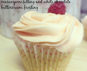 Vanilla bean cupcakes with raspberry mascarpone filling and white chocolate buttercream frosting