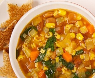 Alphabet Soup
	            
olive oil
carrot
rib celery
cloves garlic
small zucchini
vegetable broth
bottled strained tomatoes
pepper
alphabet pasta
frozen corn kernels
pinto beans or chickpeas
packed fresh spinach