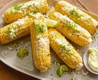 Grilled Corn on the Cob with Garlic Butter, Fresh Lime and Cotija Cheese