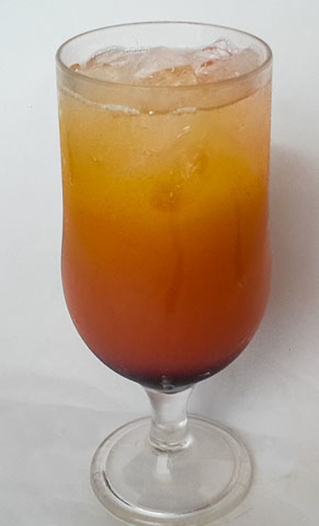 sweet and zesty tropical sunset afterglow mocktail
