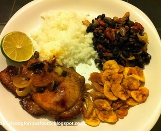 Sticky lime and chilli pork with rice & black beans & plantain chips.