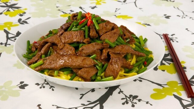 Chinese Beef, Garlic and Scape Stir-fry
	            
soy sauce
cornstarch
minced gingerroot
sesame oil
cloves garlic
pepper
top sirloin grilling steak
garlic scapes
small hot red pepper
vegetable oil
salt
beef stock
