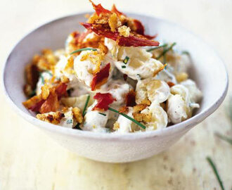 New potato salad with soured cream, chives & pancetta