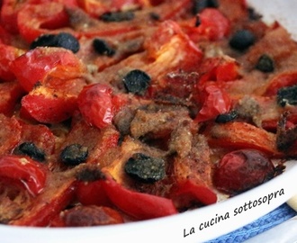 Peperoni gratinati con alici e olive nere