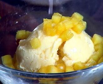 Flambeed Golden Raisins and Pineapples with Coconut Ice Cream