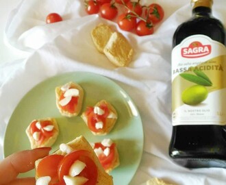 Friselline con pomodorini, mozzarella e olio Sagra Bassa Acidità