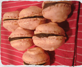 Homemade Raspberry macarons with dark chocolate ganache