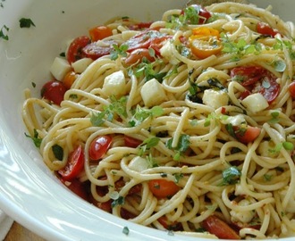 Summer garden pasta . . . spaghetti with basil, tomatoes, and mozzarella