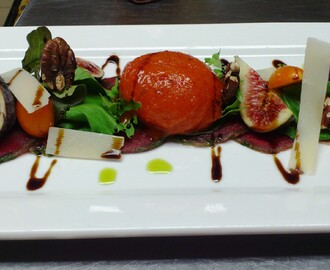 Beef Carpaccio with Roasted Red Pepper Sorbet, Fresh Figs, Pecan Nuts and Parmesan shavings