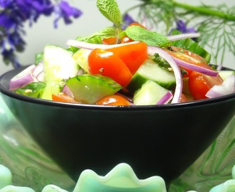 Cucumber and tomato salad with mint dressing