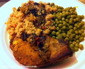 Curry pork steak with fruit couscous.