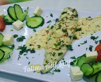 Lite fish with mayonnaise and almonds